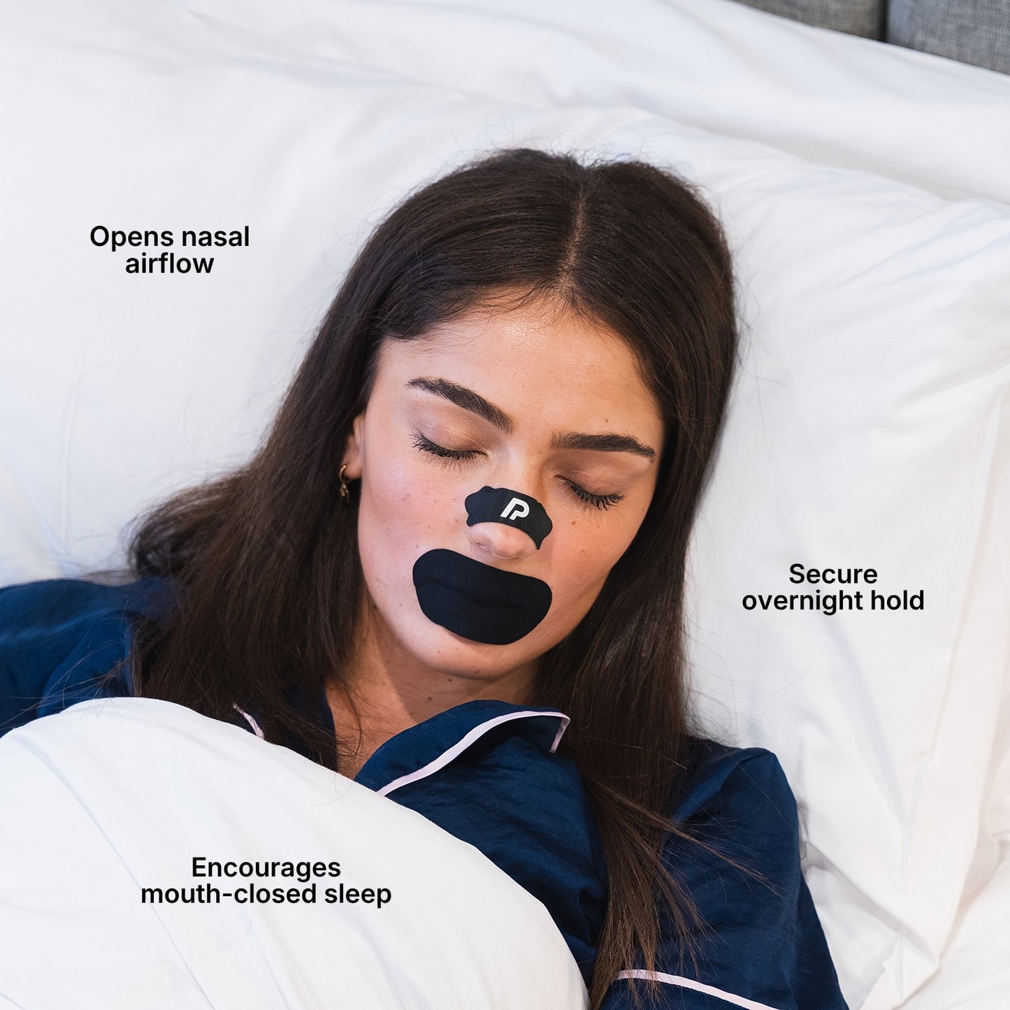 Woman resting with a black nasal strip and black mouth tape under text overlay