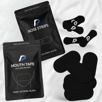 Nose strips pack and mouth tape pack with black nasal strips and black mouth tapes on white bedding