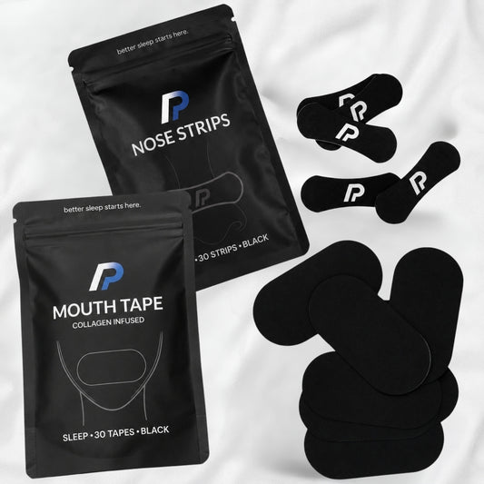 Nose strips pack and mouth tape pack with black nasal strips and black mouth tapes on white bedding